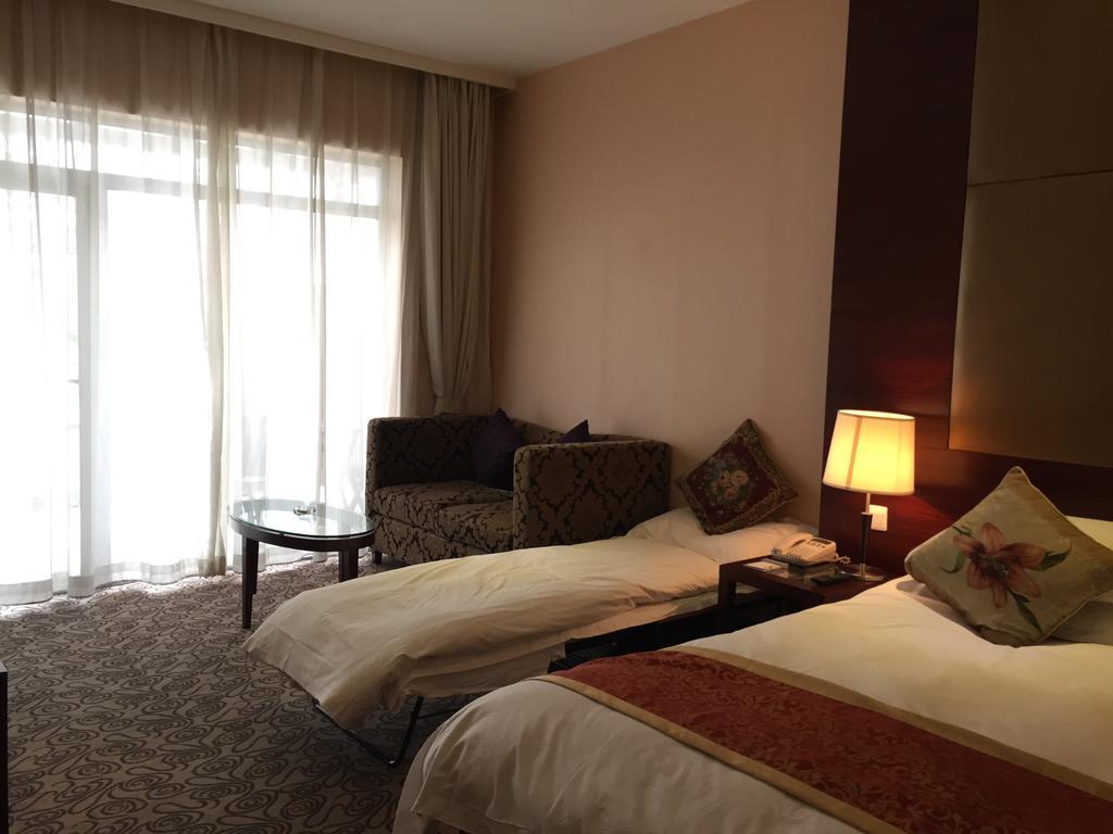 Shanghai Baron Business Bund Hotel Quarto foto