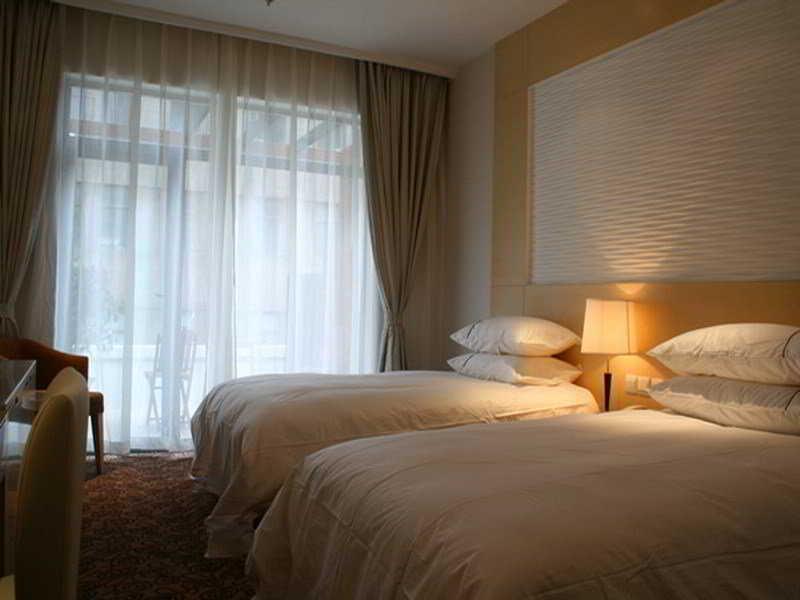 Shanghai Baron Business Bund Hotel Quarto foto