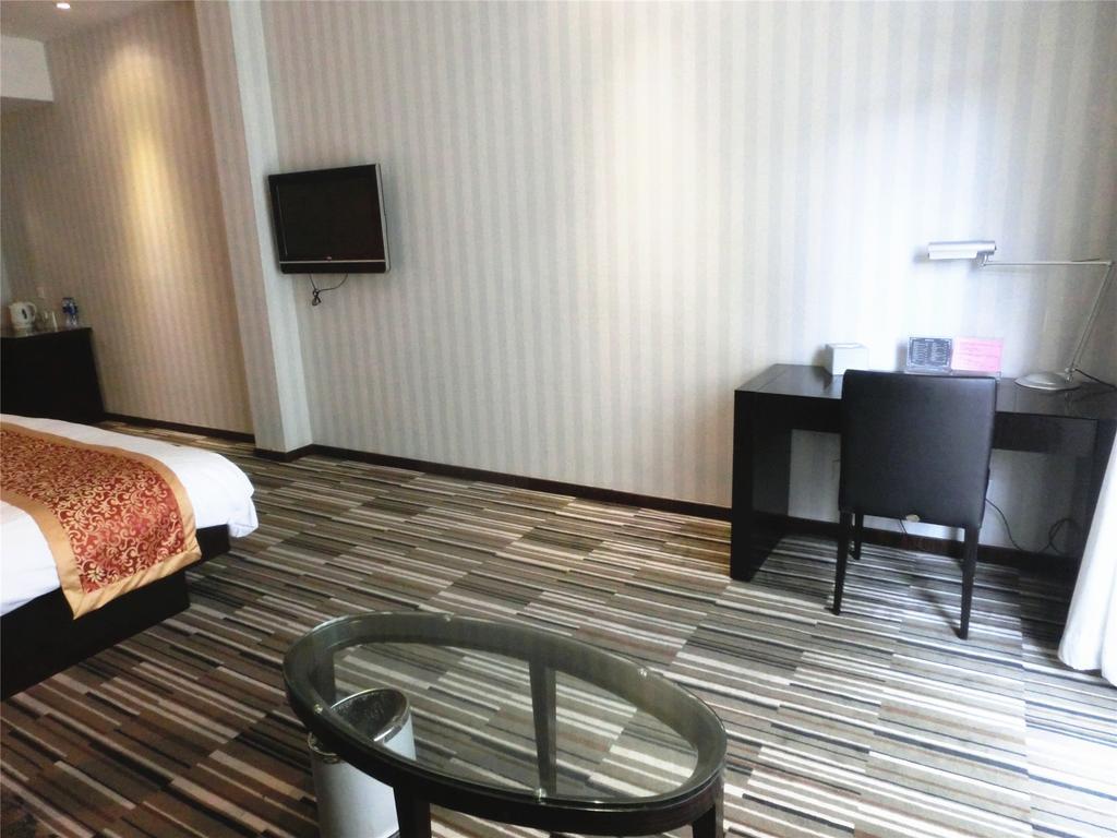Shanghai Baron Business Bund Hotel Quarto foto