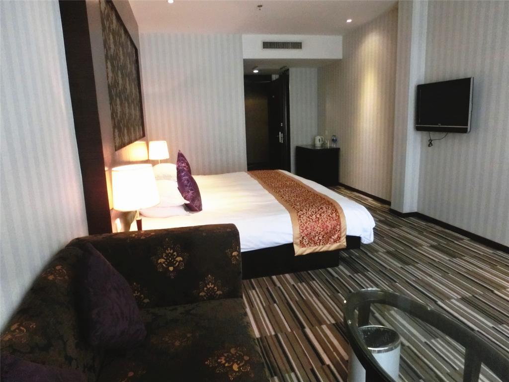 Shanghai Baron Business Bund Hotel Quarto foto