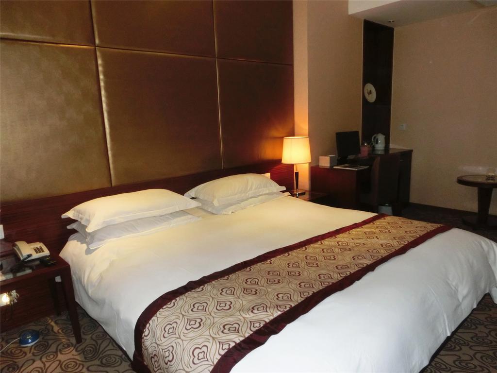 Shanghai Baron Business Bund Hotel Quarto foto