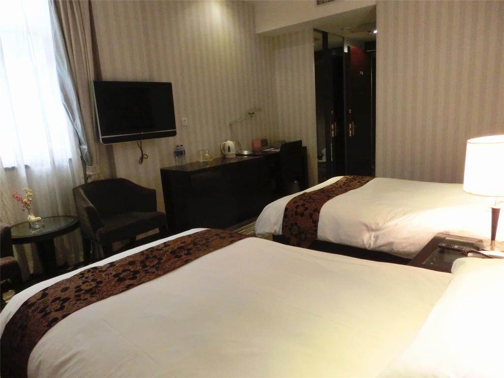 Shanghai Baron Business Bund Hotel Quarto foto