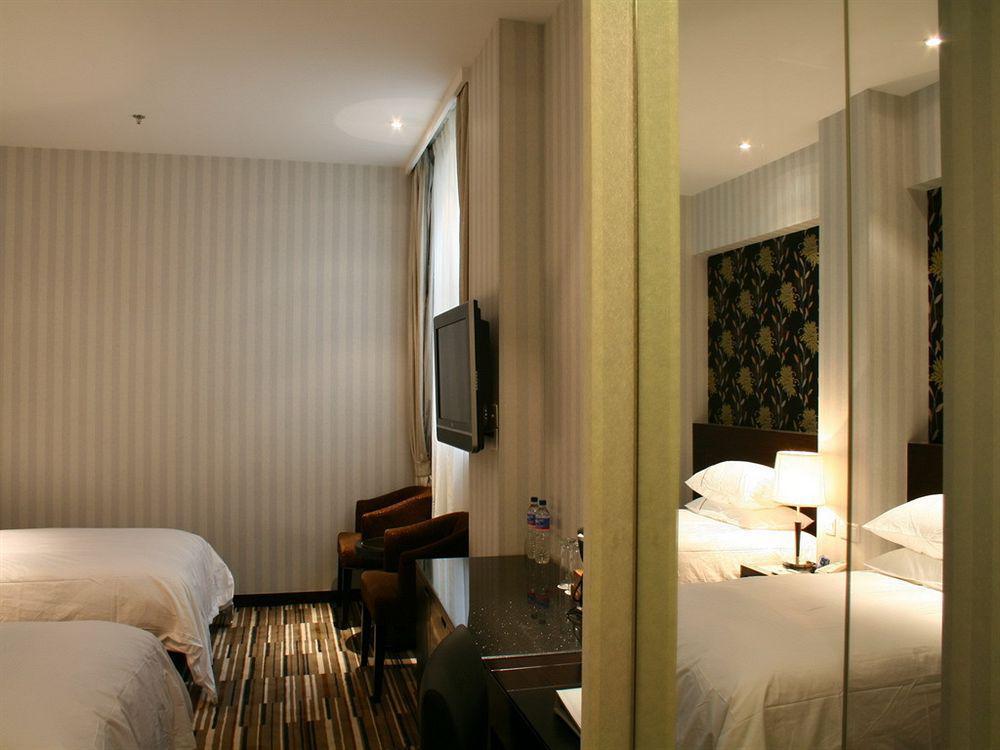 Shanghai Baron Business Bund Hotel Quarto foto